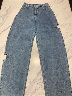 High-Rise Light Blue Boyfriend Jeans with Cutout Detail